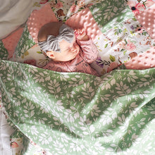 Load image into Gallery viewer, Peaceful dreams to your little one in our Spring Floral Patch Blanket with Green Leaves flannel back.