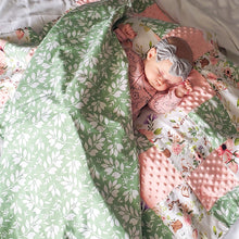 Load image into Gallery viewer, Peaceful dreams to your little one in our Spring Floral Patch Blanket with Green Leaves flannel back.